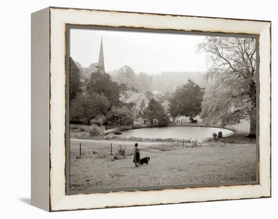 A Woman Walking Her Border Collie Dog in the Countryside-null-Framed Premier Image Canvas