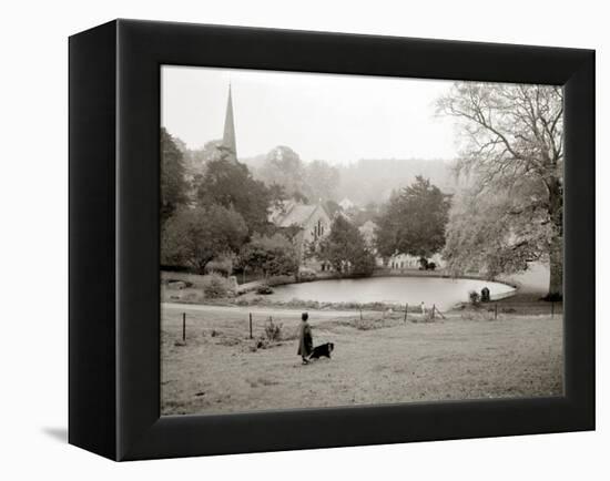 A Woman Walking Her Border Collie Dog in the Countryside-null-Framed Premier Image Canvas