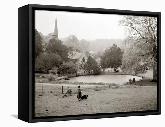 A Woman Walking Her Border Collie Dog in the Countryside-null-Framed Premier Image Canvas