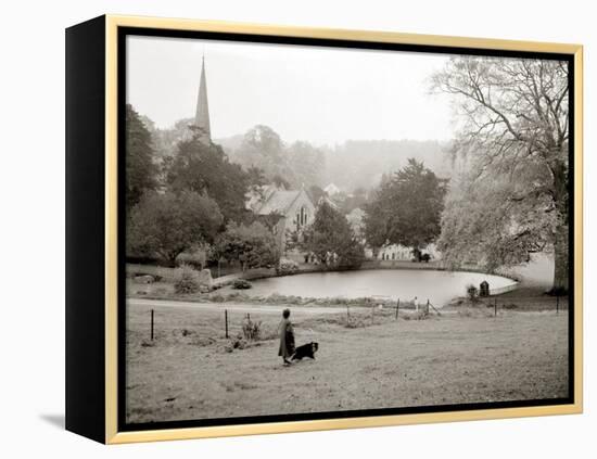 A Woman Walking Her Border Collie Dog in the Countryside-null-Framed Premier Image Canvas