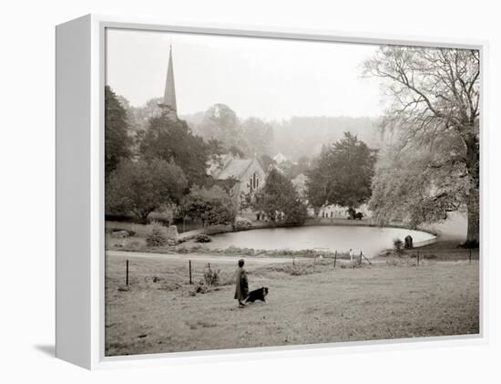 A Woman Walking Her Border Collie Dog in the Countryside-null-Framed Premier Image Canvas