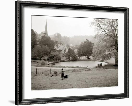 A Woman Walking Her Border Collie Dog in the Countryside-null-Framed Photographic Print