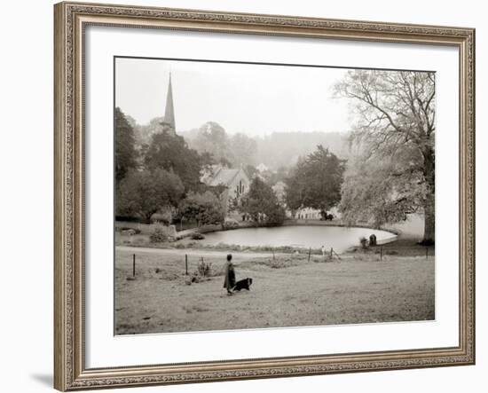 A Woman Walking Her Border Collie Dog in the Countryside-null-Framed Photographic Print