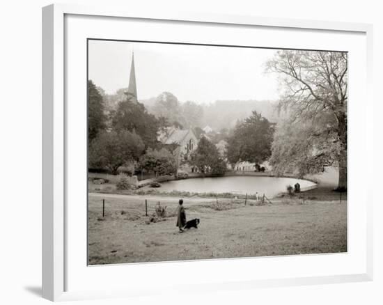 A Woman Walking Her Border Collie Dog in the Countryside-null-Framed Photographic Print