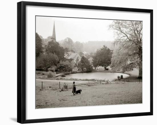 A Woman Walking Her Border Collie Dog in the Countryside-null-Framed Photographic Print