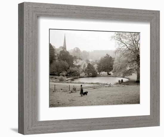 A Woman Walking Her Border Collie Dog in the Countryside-null-Framed Photographic Print