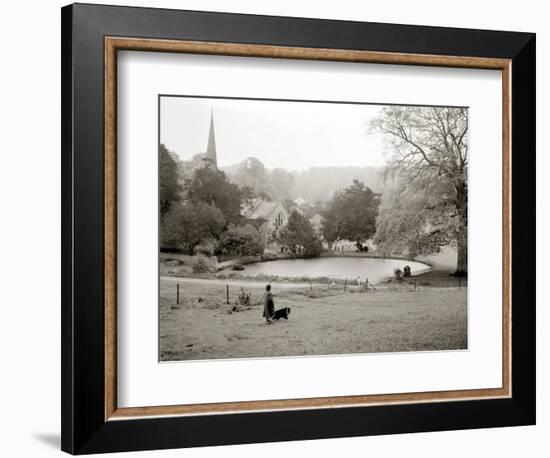 A Woman Walking Her Border Collie Dog in the Countryside-null-Framed Photographic Print