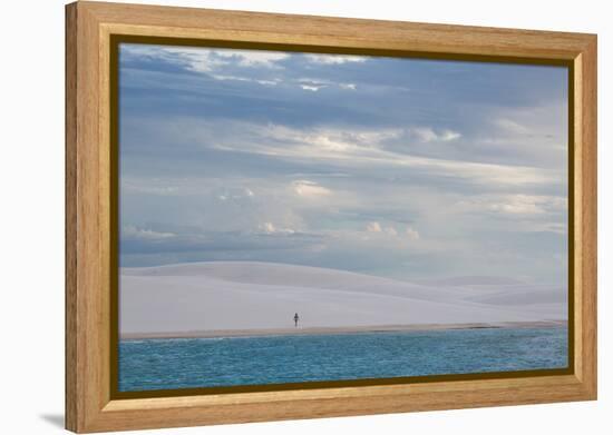 A Woman Walks across the Dunes in Brazil's Lencois Maranhenses National Park-Alex Saberi-Framed Premier Image Canvas