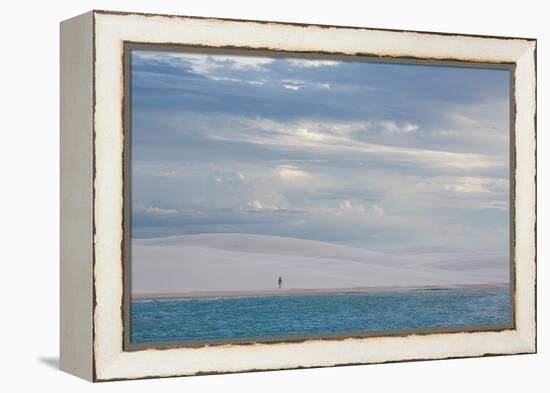 A Woman Walks across the Dunes in Brazil's Lencois Maranhenses National Park-Alex Saberi-Framed Premier Image Canvas