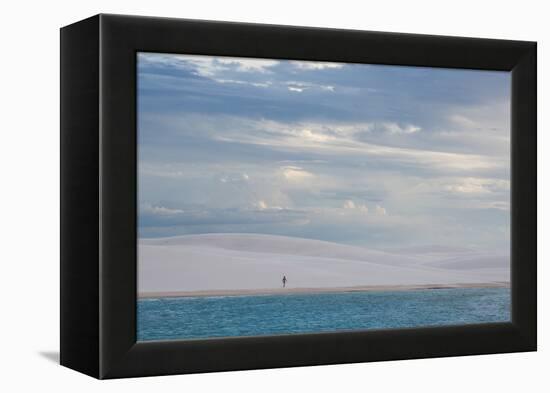 A Woman Walks across the Dunes in Brazil's Lencois Maranhenses National Park-Alex Saberi-Framed Premier Image Canvas