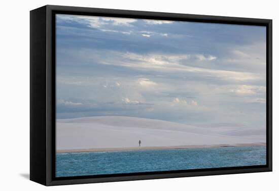 A Woman Walks across the Dunes in Brazil's Lencois Maranhenses National Park-Alex Saberi-Framed Premier Image Canvas