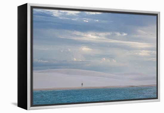 A Woman Walks across the Dunes in Brazil's Lencois Maranhenses National Park-Alex Saberi-Framed Premier Image Canvas