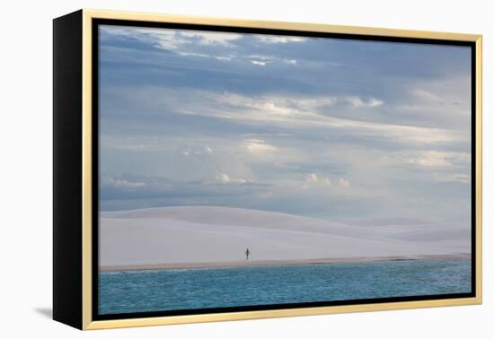 A Woman Walks across the Dunes in Brazil's Lencois Maranhenses National Park-Alex Saberi-Framed Premier Image Canvas