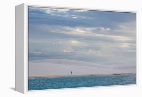 A Woman Walks across the Dunes in Brazil's Lencois Maranhenses National Park-Alex Saberi-Framed Premier Image Canvas