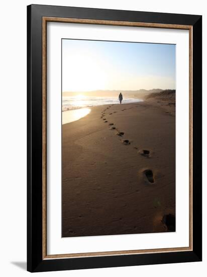 A Woman Walks Down A Secluded Beach On Sicily's Southern Coast-Erik Kruthoff-Framed Photographic Print