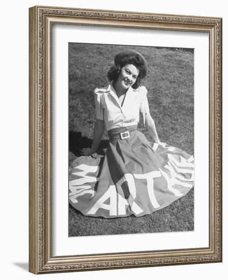 A Woman Wearing a Skirt That Says "Macarthur" in Honor of General Douglas Macarthur-null-Framed Photographic Print