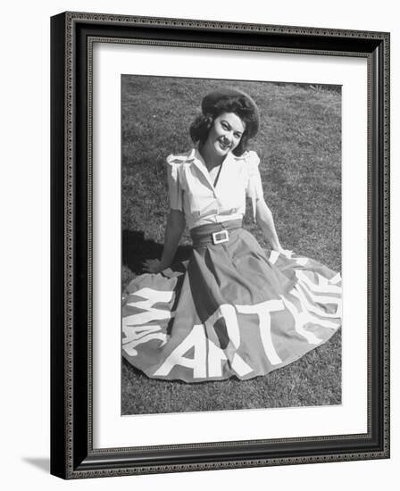 A Woman Wearing a Skirt That Says "Macarthur" in Honor of General Douglas Macarthur-null-Framed Photographic Print