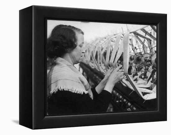 A Woman Working in a Silk and Rayon Mill, Burnley, Lancashire, Britain-Henry Grant-Framed Premier Image Canvas