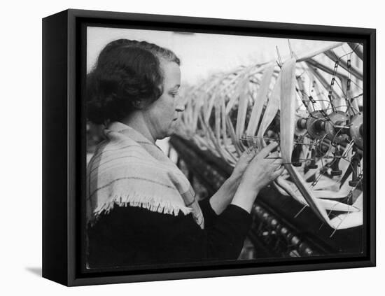 A Woman Working in a Silk and Rayon Mill, Burnley, Lancashire, Britain-Henry Grant-Framed Premier Image Canvas