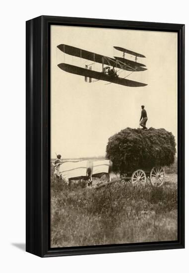 A Wright Airplane over a Hayfield in France, 1908, Flown by Wilbur Wright and a Pupil-null-Framed Premier Image Canvas