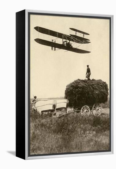 A Wright Airplane over a Hayfield in France, 1908, Flown by Wilbur Wright and a Pupil-null-Framed Premier Image Canvas