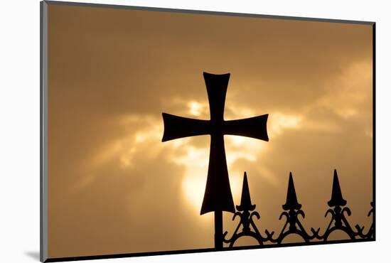 A wrought-iron cross on a fence in Syria at sunrise.-Emily Wilson-Mounted Photographic Print