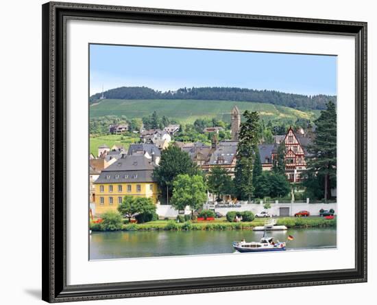 A Yacht Sails by the Town of Traben-Trarbach, Germany-Miva Stock-Framed Photographic Print