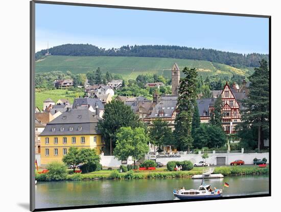A Yacht Sails by the Town of Traben-Trarbach, Germany-Miva Stock-Mounted Photographic Print