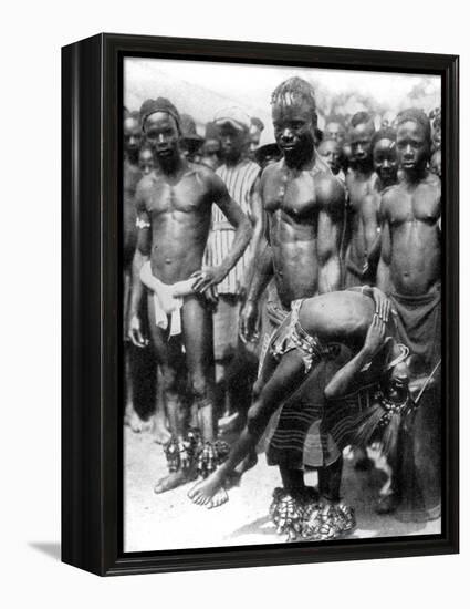 A Yafouba Tribesman Juggles with a Girl, Ivory Coast, West Africa, 1936-null-Framed Premier Image Canvas