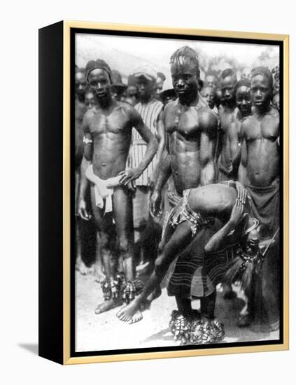 A Yafouba Tribesman Juggles with a Girl, Ivory Coast, West Africa, 1936-null-Framed Premier Image Canvas