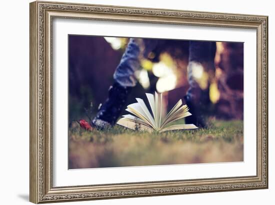 A Young Adult Standing over an Open Book-Carolina Hernández-Framed Photographic Print