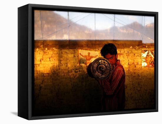 A Young Afghan Man Exercises with a Barbell in Kabul-null-Framed Premier Image Canvas