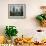 A Young Afghan Refugee Boy Stands in a Pair of Adult's Shoes-null-Framed Photographic Print displayed on a wall