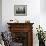 A Young Afghan Refugee Boy Stands in a Pair of Adult's Shoes-null-Framed Photographic Print displayed on a wall