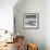 A Young Boy Kicks a Ball on Itamambuca Beach in Ubatuba, Brazil-Alex Saberi-Framed Photographic Print displayed on a wall