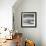 A Young Boy Kicks a Ball on Itamambuca Beach in Ubatuba, Brazil-Alex Saberi-Framed Photographic Print displayed on a wall