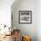 A Young Boy Kicks a Ball on Itamambuca Beach in Ubatuba, Brazil-Alex Saberi-Framed Photographic Print displayed on a wall