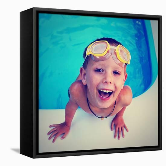 A Young Boy Swimming in a Small Pool-graphicphoto-Framed Premier Image Canvas