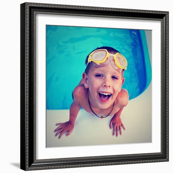 A Young Boy Swimming in a Small Pool-graphicphoto-Framed Photographic Print