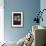 A Young Couple in the Centre of a Flower with Ladybird-null-Framed Photographic Print displayed on a wall