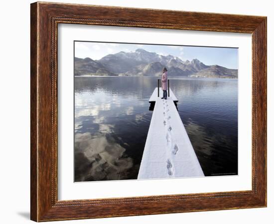A Young Girl Enjoys the Sunny Winter Weather-Christof Stache-Framed Photographic Print
