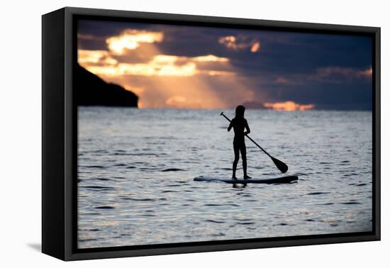 A Young Girl on a Stand Up Paddle Board on Baleia Beach at Sunset-Alex Saberi-Framed Premier Image Canvas