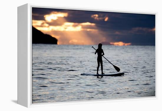 A Young Girl on a Stand Up Paddle Board on Baleia Beach at Sunset-Alex Saberi-Framed Premier Image Canvas