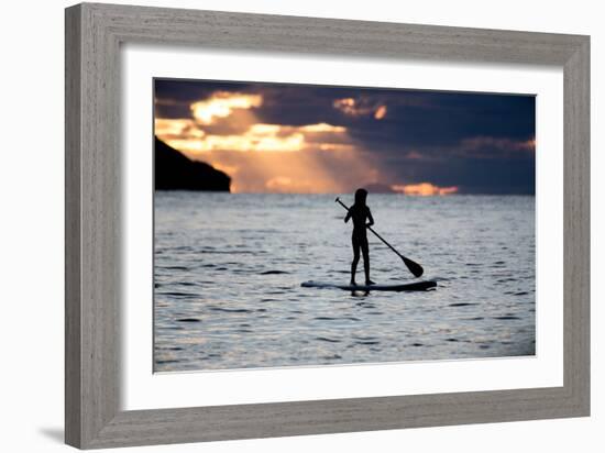 A Young Girl on a Stand Up Paddle Board on Baleia Beach at Sunset-Alex Saberi-Framed Photographic Print