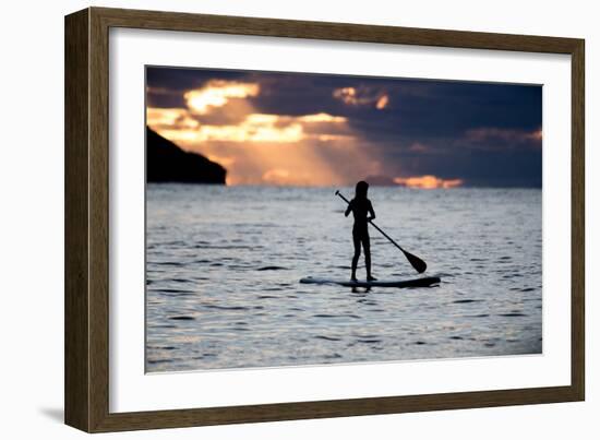 A Young Girl on a Stand Up Paddle Board on Baleia Beach at Sunset-Alex Saberi-Framed Photographic Print