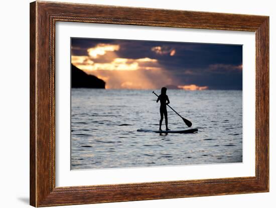 A Young Girl on a Stand Up Paddle Board on Baleia Beach at Sunset-Alex Saberi-Framed Photographic Print