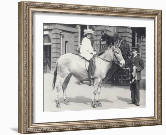 A Young Lady Riding an Ass Which Is Being Led by One Keeper While Another Looks On-Frederick William Bond-Framed Photographic Print