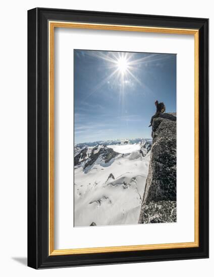 A Young Male Climber on the Summit of Pigeon Spire, Bugaboos, British Columbia-Steven Gnam-Framed Photographic Print