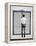 A Young Man Standing in the Street Looking at a Pair of Doors-India Hobson-Framed Premier Image Canvas