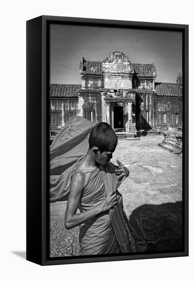 A Young Monk at Angkor Wat, Cambodia-Steven Boone-Framed Premier Image Canvas